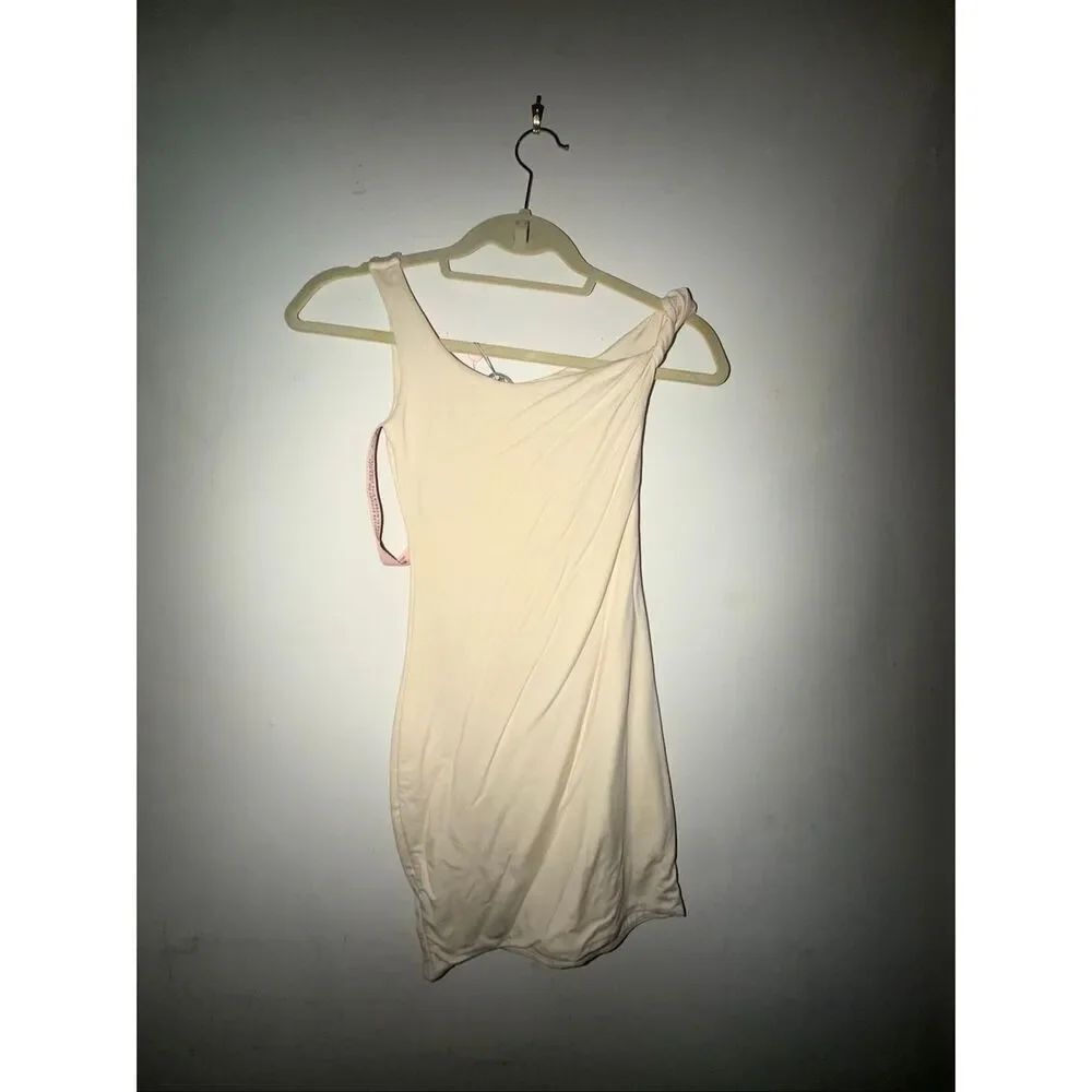 Oh Pollyβmini dress new with tags size 0 ivory